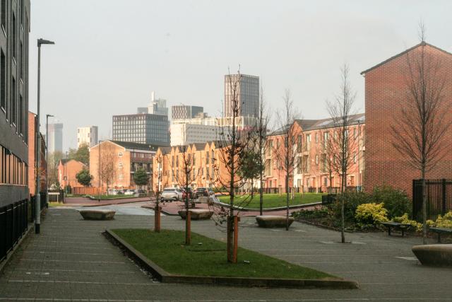 Brunswick - an inner city neighbourhood of red brick houses and a green space.