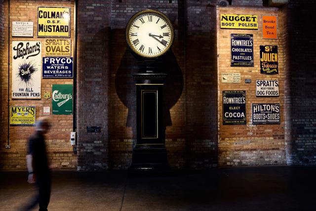 A view of the wayfinding and signage within the station hall.