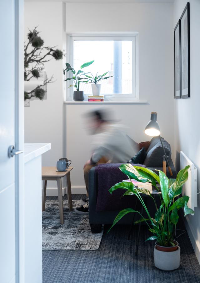 Interior shot of the RSAP living room/space in use.